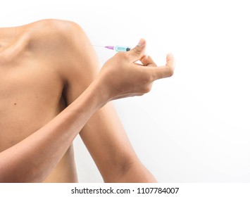 Slim Man Taking Steroids Injection In Shoulder On White Background