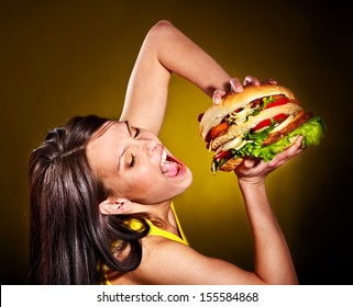 Slim Woman Holding Hamburger.