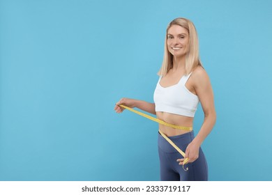 https://image.shutterstock.com/image-photo/slim-woman-measuring-waist-tape-260nw-2333719117.jpg