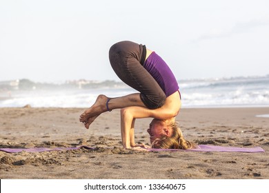 Slim Woman Standing On Her Head  Doing Yoga Ã¢Â?Â?upside Down