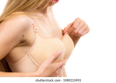 Slim Young Woman Small Breast Wearing Wrong Size Bra, Bosom, Brafitting And Underwear Concept.