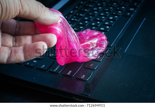 Slime is the ultimate tool to clean the keyboard\
from dust and dirt