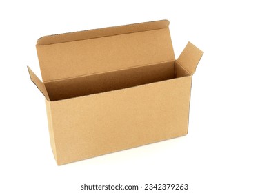 Slimline brown cardboard rectangular shape box on white background. Environmentally friendly recycled reusable material for delivery parcel package.