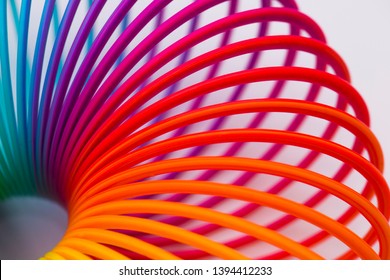 Slinky Toy Curved Rainbow Pattern Background