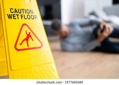 Slip Fall Accident. Floor Sign Caution And Safety