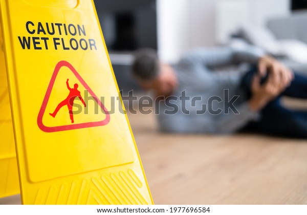Slip Fall\
Accident. Floor Sign Caution And\
Safety