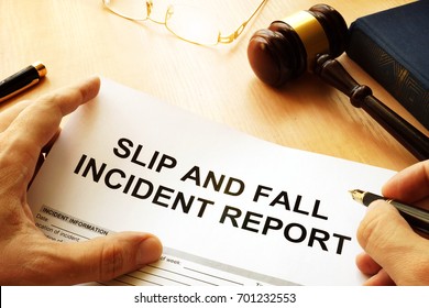 Slip And Fall Injury Report On A Table.