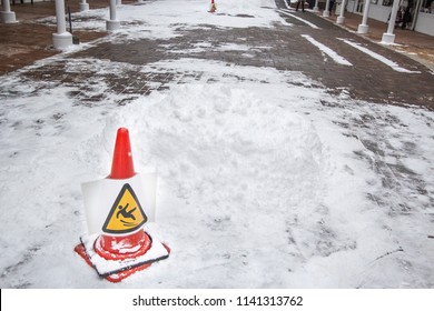 Slip On The Slip Ice And Snow On The Ground. Warning Sign