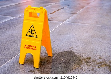 Slippery Warning Sign Germany Translation Lookout Stock Photo ...