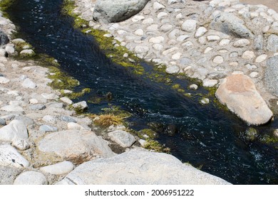 Sliver Of Water Running Through Rocks