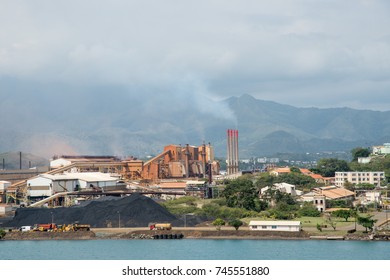 SLN Plant With Smoke Stack On Ocean Waterfront In Noumea, New Caledonia/SLN Plant/NOUMEA, NEW CALEDONIA-NOVEMBER 25,2016: SLN Plant With Smoke Stack On Ocean Waterfront In Noumea, New Caledonia