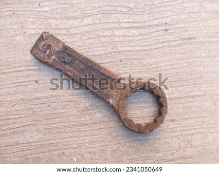 slogging ring spanner wrench old, rusty and dirty