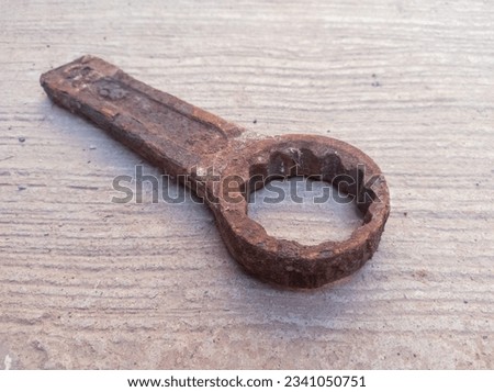 slogging ring spanner wrench old, rusty and dirty