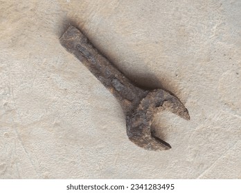 slogging ring spanner wrench open end old, rusty and dirty