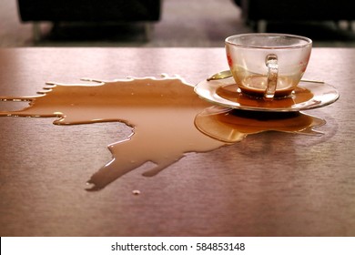 slop of coffee on table in cafe - Shutterstock ID 584853148