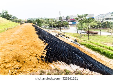 Slope Erosion Control With Grids And Earth On Steep Slope.