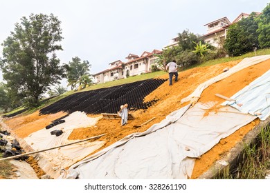 Slope Erosion Control With Grids And Earth On Steep Slope.