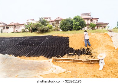 Slope Erosion Control With Grids And Earth On Steep Slope.