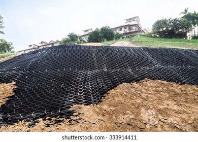 Slope Erosion Control With Grids And Earth On Steep Slope At A Residential Community