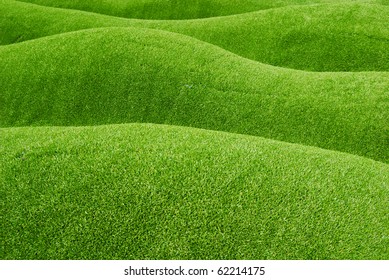 Slope Of Green Grass For Background