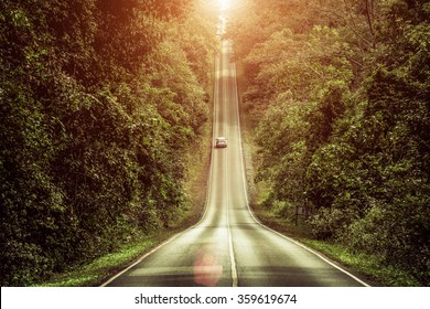 Slope Mountain Road With Sunshine At Khao Yai, Thailand