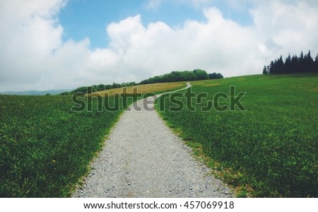 Sloping trail into the hillside