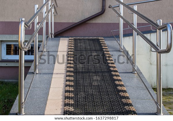 Sloping Walkway Surrounded By Shiny Handrails Stock Photo 1637298817 Sloping Walkway Surrounded By Shiny Handrails Stock Photo 1637298817