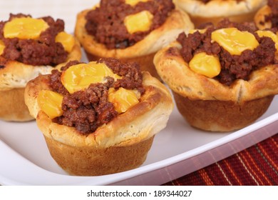Sloppy Joe In A Biscuit With Melted Cheese On A Baking Dish 
