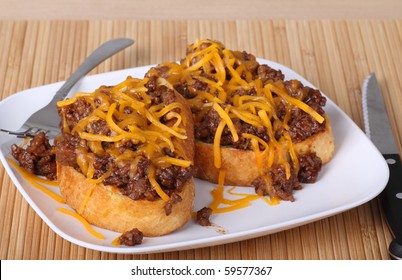 Sloppy Joe Sandwich On Texas Toast Covered With Shredded Cheese