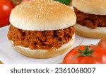 Sloppy Joes: A sandwich made with ground beef or turkey cooked in a tomato-based sauce, often served on a bun.