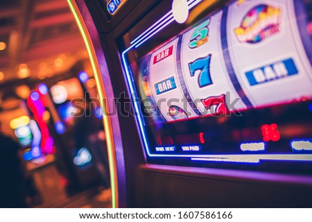Slot Machine One Handed Bandit Game. Rolling Drums. Casinos and Gambling Industry.
