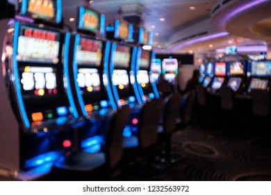 Slot machines, Las Vegas, Nevada. Blurred background. Gambling, Addiction Themed - Powered by Shutterstock