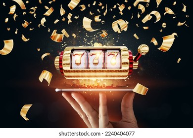 Slots online, playing 777 on a smartphone, gambling, betting, casino, jackpot coins mixed media - Shutterstock ID 2240404077
