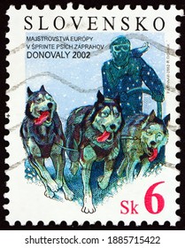 SLOVAKIA - CIRCA 2002: A Stamp Printed In Slovakia Shows Dog Sled, European Dog Sled Championships, Donovaly 2002, Circa 2002