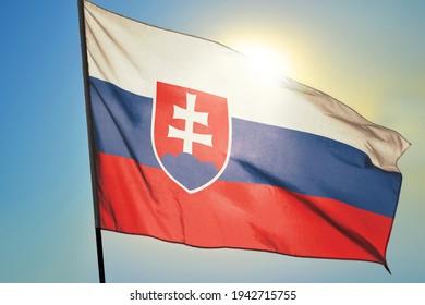 Slovakia Flag Waving On The Wind In Front Of Sun