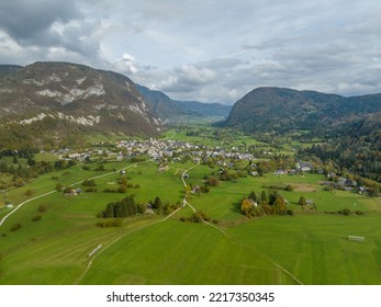 Slovenia - Landscape Drone View Above The Small Town Around With The Julian Alps