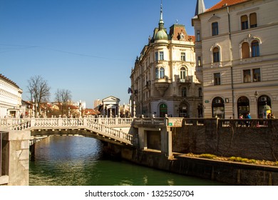 Slovenia. Ljubljana-27.02.2019: tourists walk through the historic part of the city with old buildings and monuments