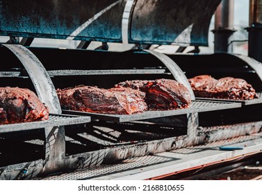 Slow Cooked Beef Brisket Meat On The Grill Grates Of A Smoker Barbecue