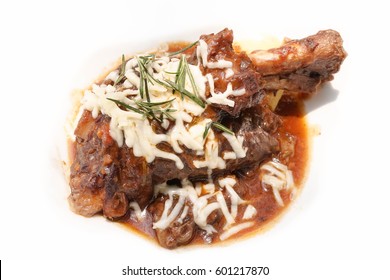 Slow Cooked Lamb Shank With Vegetables Or Stewed Lamb Isolated On A White Background