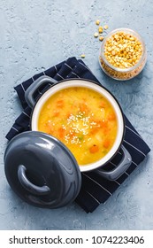 Slow Cooker Pea Soup In A Pot On Blue Concrete Background. Top View, Copy Space.