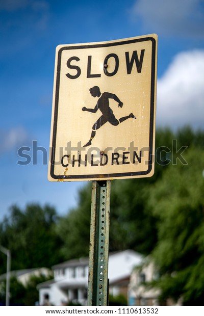Slow Down, Children at Play\
Sign