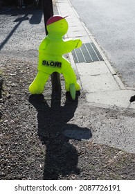 Slow Down Signage On Roadside In Japan