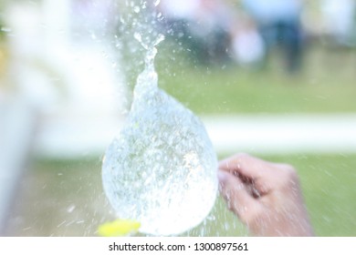 Slow Motion Picture At A High Shutter Speed Of A Water Balloon Being Burst