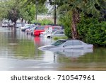 Slow moving storms like Harvey (2017) and Florence (2018) bring significant flooding to populated areas. Water could enter the engine, transmission parts or other places. Severe weather concept.