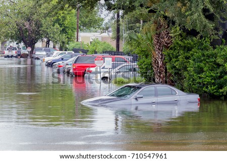 Slow moving storms like Harvey (2017) and Florence (2018) bring significant flooding to populated areas. Water could enter the engine, transmission parts or other places. Severe weather concept.