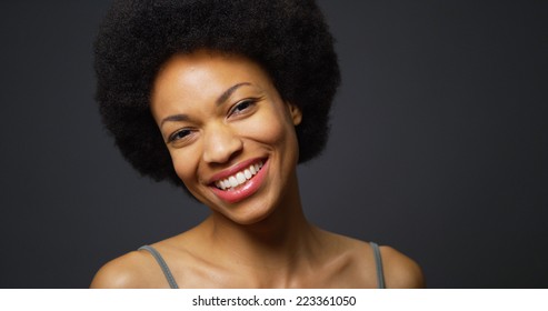 Slow Pan Up African Woman Laughing And Smiling