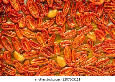 Slow Roasted Cherry Tomato Confit With Garlic And Thyme. Food Background Texture.