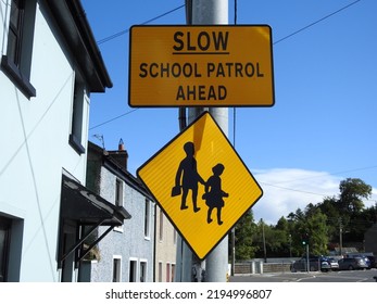 'Slow School Patrol Ahead' Road Sign. 