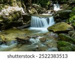 Slow shutter photo of Barshangarh waterfall in Shangarh situated in Sainj Valley of Himachal Pradesh India