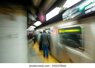 Slow Shutter Speed Blur And Zoom Techniques. Abstract Photo Of New York City Subway Train System In Manhattan In USA 